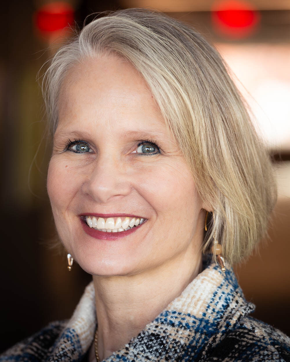 A head-and-shoulders portrait of Amy Jardell, a woman with light skin and blonde hair