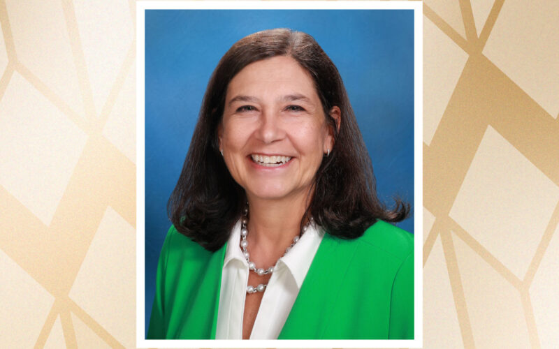 Portrait of Stephanie Stenger on top of a gold-colored background
