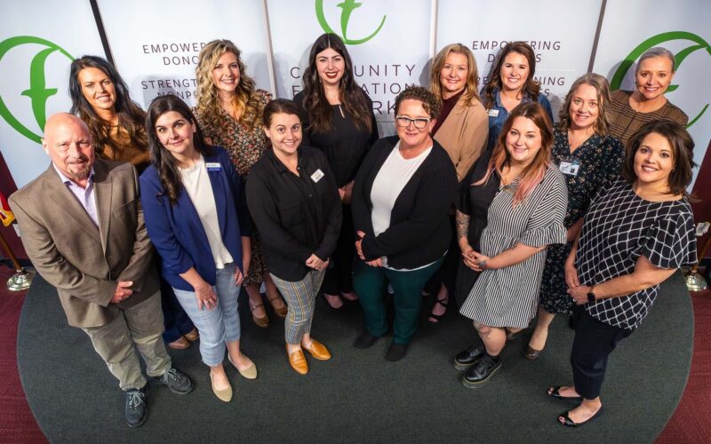 A group of people representing schools, school foundations and nonprofits celebrate grants presented by the Community Foundation of the Ozarks and the Coover Charitable Foundation.