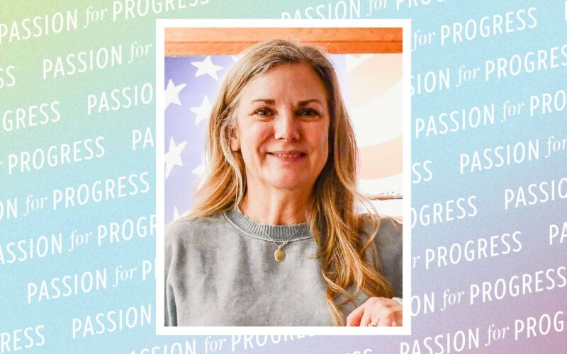 Portrait of Laura Dumey, a woman with long blonde hair wearing a gray sweatshirt, with an American flag mural in the background. Behind the portrait, Passion for Progress is repeated on a multicolored background.
