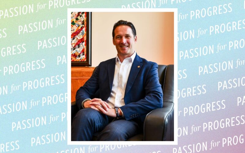 Portrait of Andy Drennen with "Passion for Progress" repeated over a multicolored background.