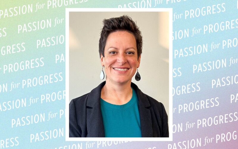 A multicolored background with a repeating pattern that reads Passion for Progress with a photo in the center. The photo is a portrait of a woman, smiling and wearing a dark-colored jacket.