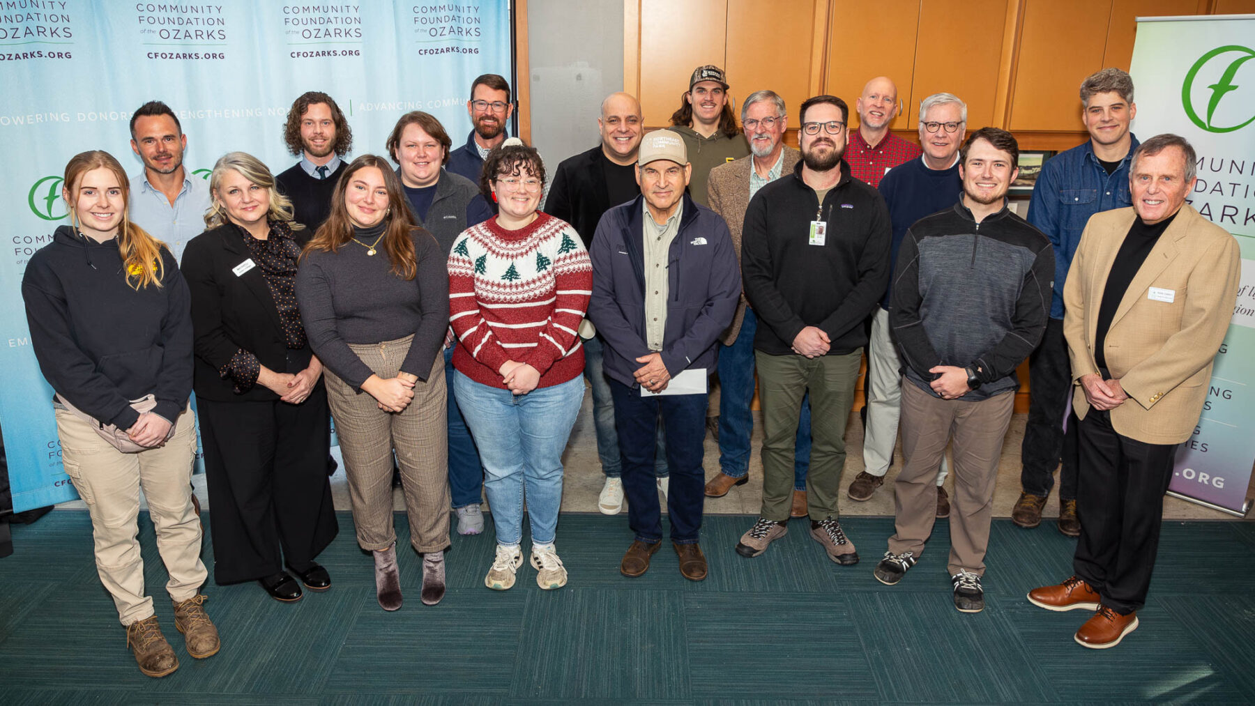 A group of nonprofit leaders pose for a photo at the Watershed Center in Springfield.