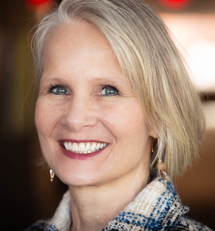 A head-and-shoulders portrait of Amy Jardell, a woman with light skin and blonde hair