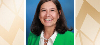 Portrait of Stephanie Stenger on top of a gold-colored background
