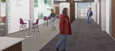 Rendering of a modern interior hallway with seating areas, glass walls, and a “Philanthropy Hall of Fame” display.