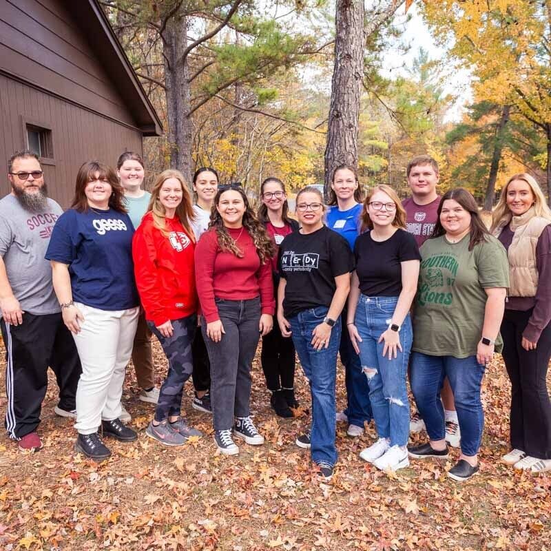 Thirteen members of the Ozarks Teacher Corps, college and graduate students studying teacher education who have received a special scholarship, gathered at Montauk State Park in October 2024.